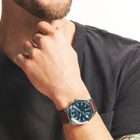 Reloj Fossil caja de acero y esfera azul con correa marron,