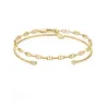 Conjunto de 2 pulseras doradas.